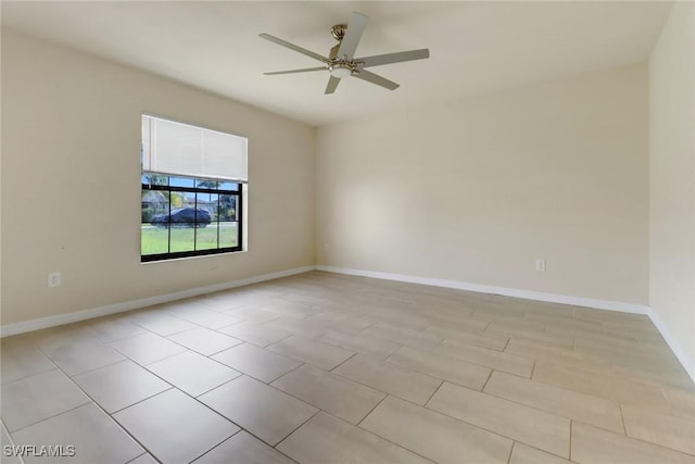 unfurnished room with ceiling fan