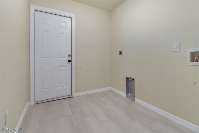 clothes washing area featuring hookup for an electric dryer, washer hookup, and light tile patterned floors