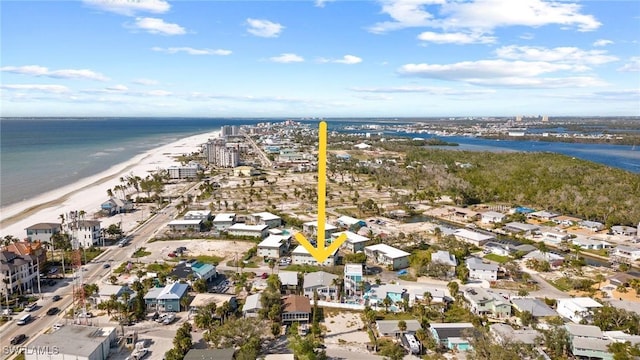 aerial view with a water view and a view of the beach