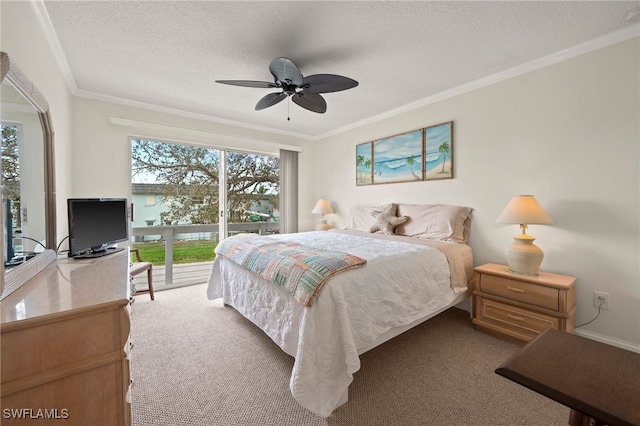 bedroom featuring ceiling fan, ornamental molding, and a textured ceiling