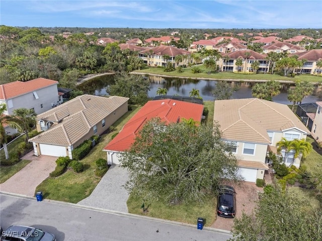 drone / aerial view with a water view