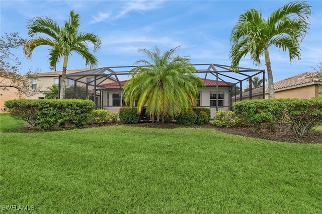 view of yard featuring a lanai