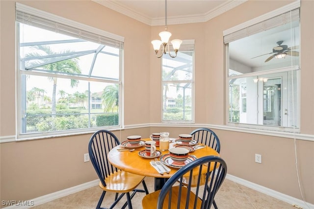 dining area with ceiling fan with notable chandelier, light tile patterned flooring, and crown molding