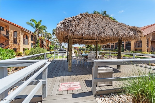 wooden terrace with a gazebo