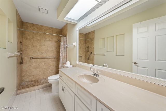 bathroom featuring a shower with curtain, vanity, toilet, and tile patterned flooring