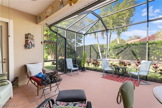 view of patio with a lanai