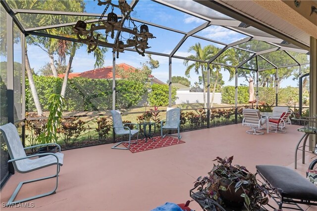 view of patio / terrace with a lanai