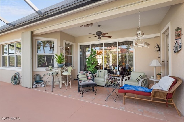 view of patio featuring a ceiling fan