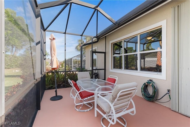 sunroom / solarium featuring a healthy amount of sunlight