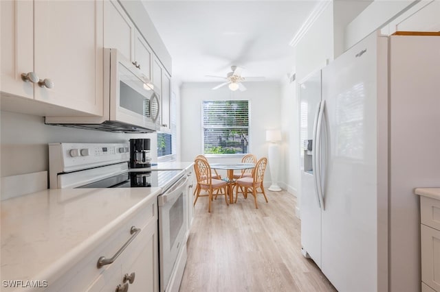 kitchen with white cabinetry, ceiling fan, light hardwood / wood-style flooring, crown molding, and white appliances