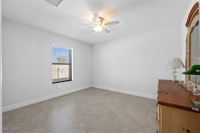 unfurnished room featuring ceiling fan