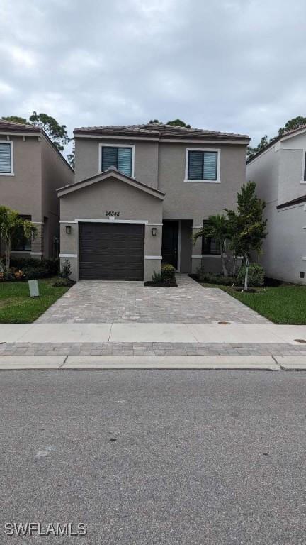 front facade with a garage