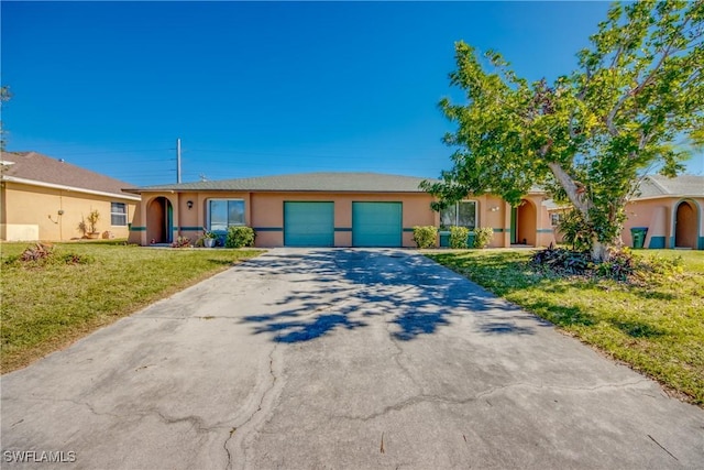 ranch-style home with a garage and a front yard