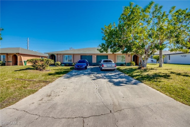 ranch-style home with a garage and a front lawn