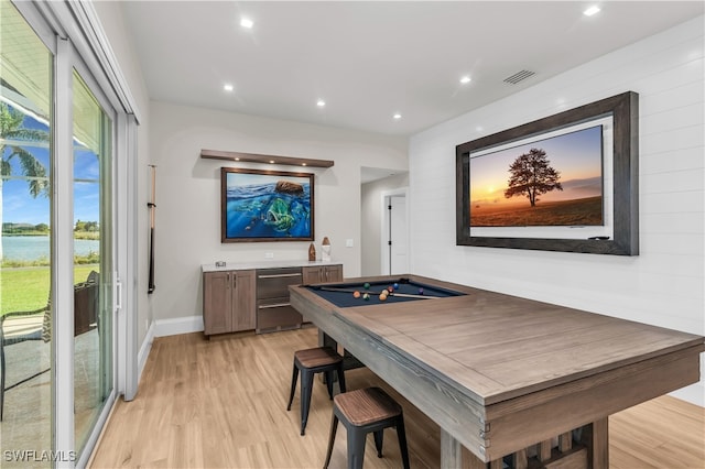 dining room featuring billiards and light wood-type flooring