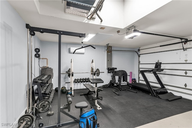 workout area featuring a wall mounted AC