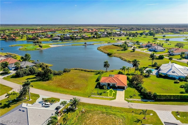 drone / aerial view featuring a water view