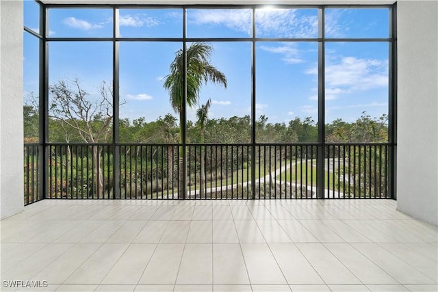 unfurnished sunroom with a wealth of natural light