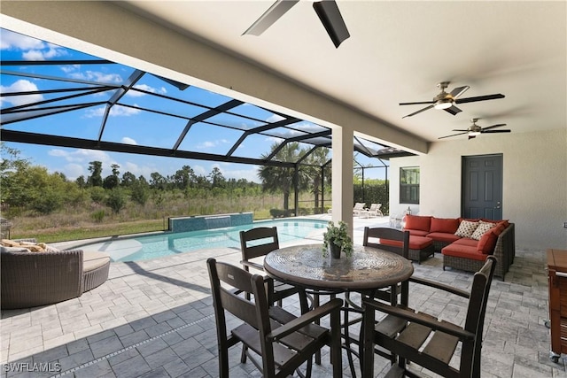 view of swimming pool with a lanai, a patio area, an outdoor living space, and pool water feature