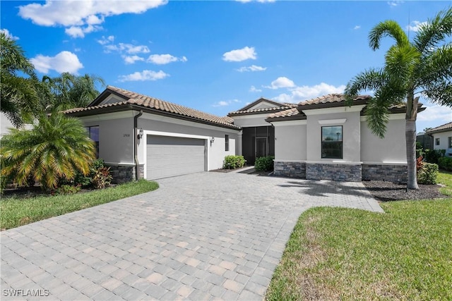 mediterranean / spanish-style home featuring a garage