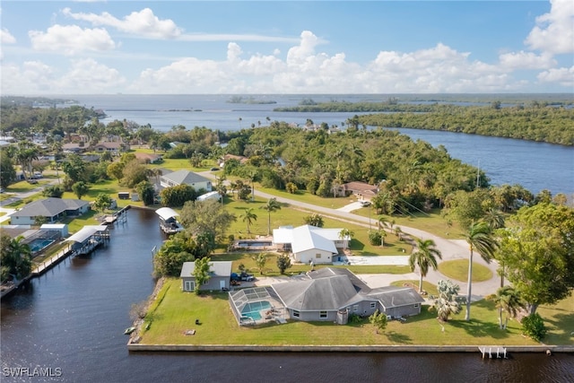 drone / aerial view with a water view