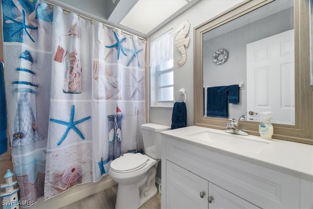 full bathroom featuring vanity, shower / bath combo, and toilet