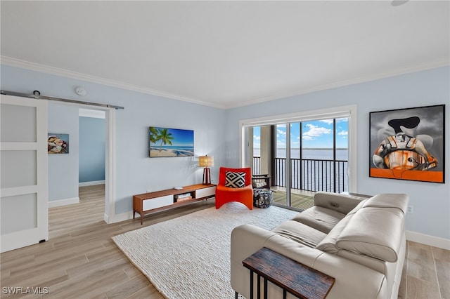 living room with crown molding and light hardwood / wood-style flooring