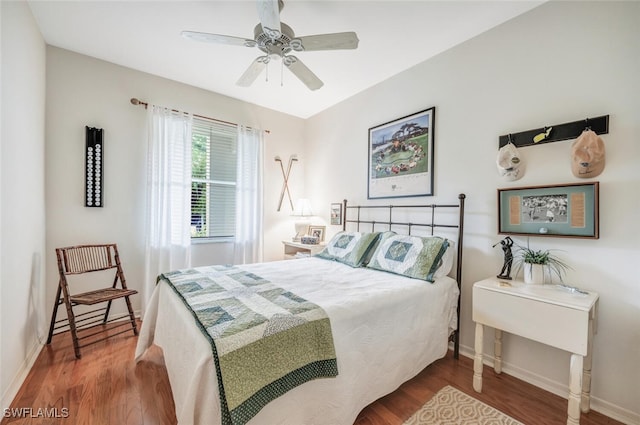 bedroom with ceiling fan and wood-type flooring