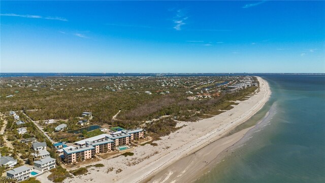 aerial view featuring a view of the beach and a water view