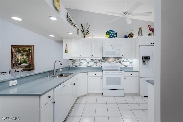 kitchen featuring white appliances, ceiling fan, sink, light tile patterned floors, and white cabinetry