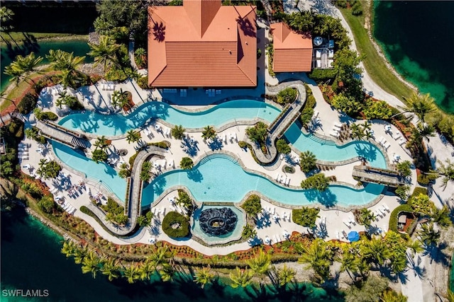 birds eye view of property featuring a water view