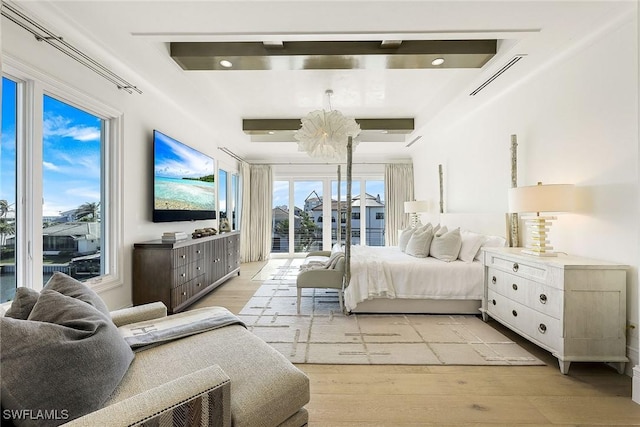 bedroom featuring light wood-type flooring