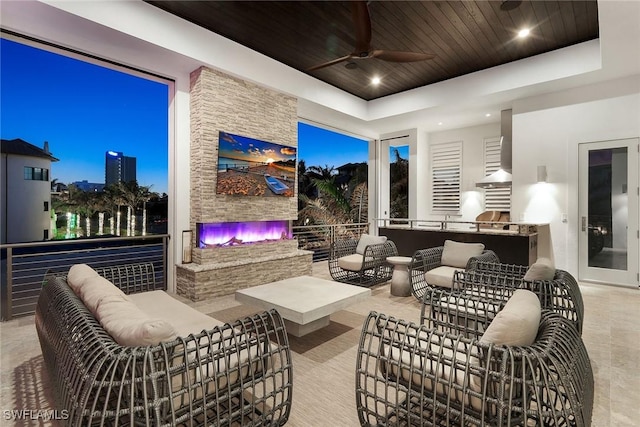 view of patio / terrace with ceiling fan and an outdoor hangout area