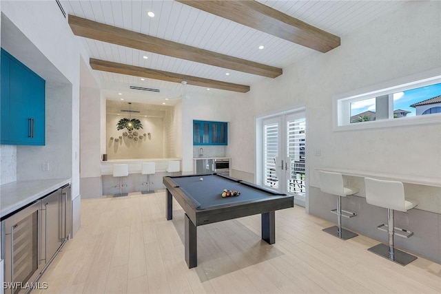 recreation room featuring beamed ceiling, wooden ceiling, billiards, and light hardwood / wood-style flooring