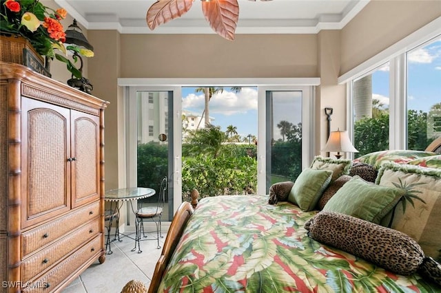 bedroom featuring access to exterior, light tile patterned floors, and crown molding