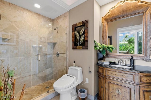 bathroom featuring recessed lighting, a shower stall, toilet, and vanity