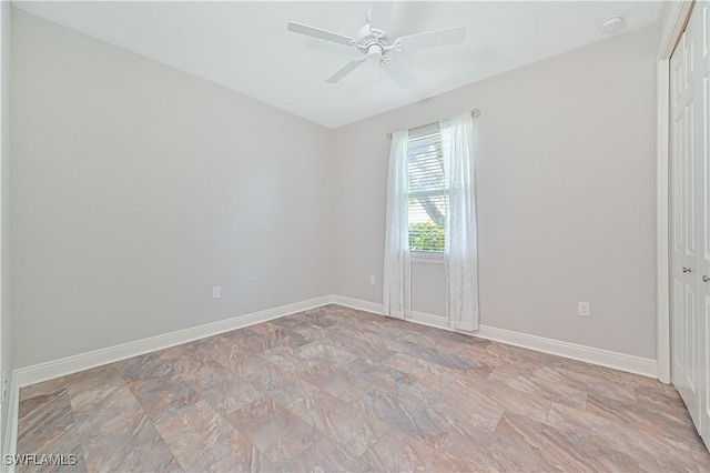 spare room featuring ceiling fan