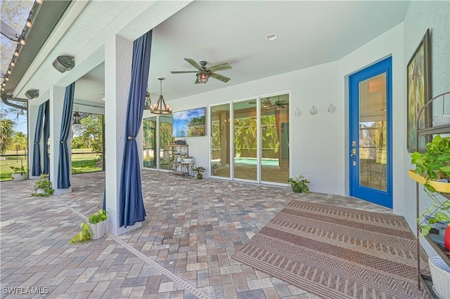 view of patio with ceiling fan