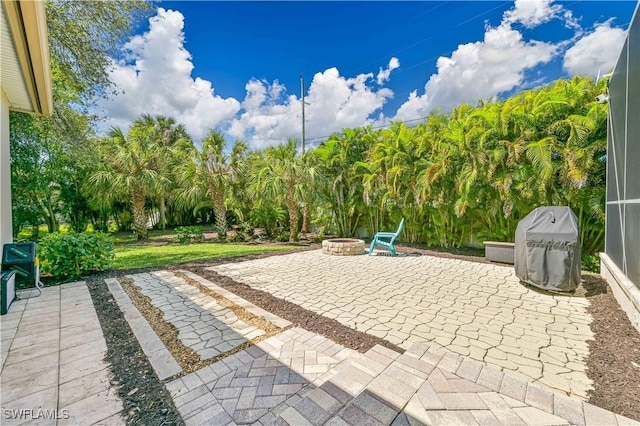 view of patio featuring a fire pit