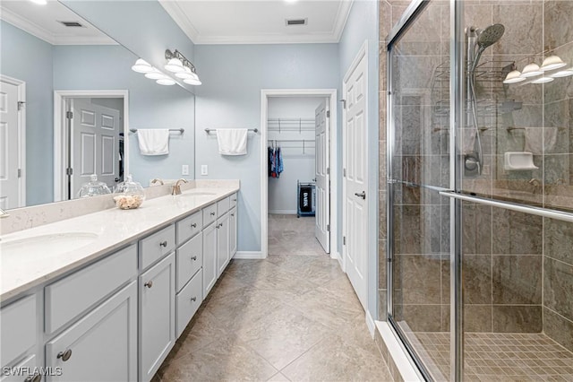 bathroom with vanity, walk in shower, and crown molding