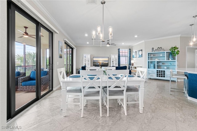 tiled dining room featuring ceiling fan with notable chandelier, crown molding, and a wealth of natural light