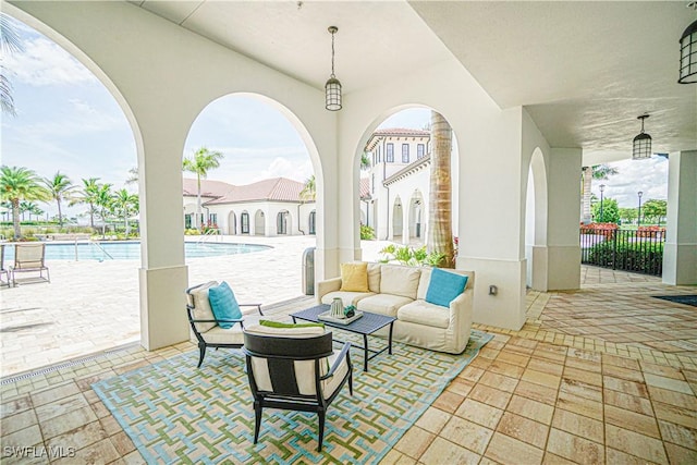 view of patio featuring an outdoor hangout area and a community pool