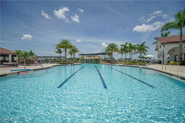 view of swimming pool with a patio area