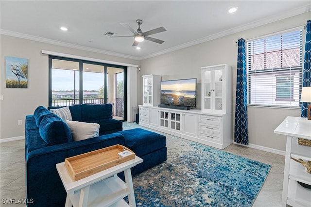 tiled living room featuring ceiling fan and ornamental molding