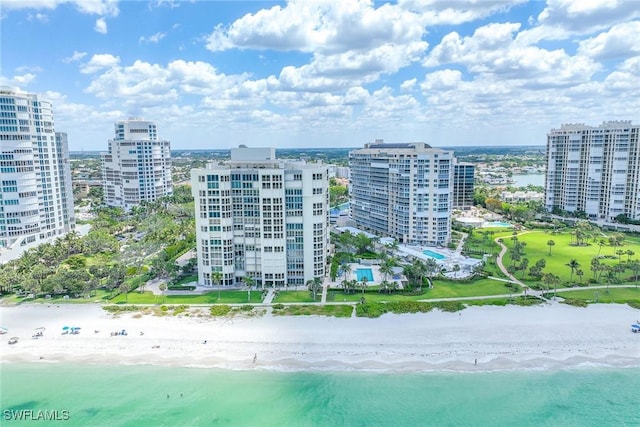 aerial view with a beach view and a water view