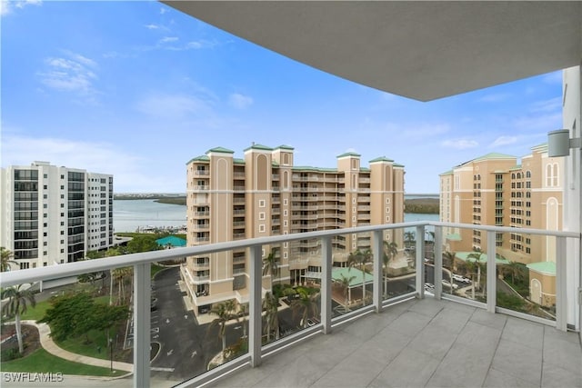 balcony featuring a water view