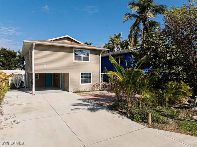 exterior space with a carport