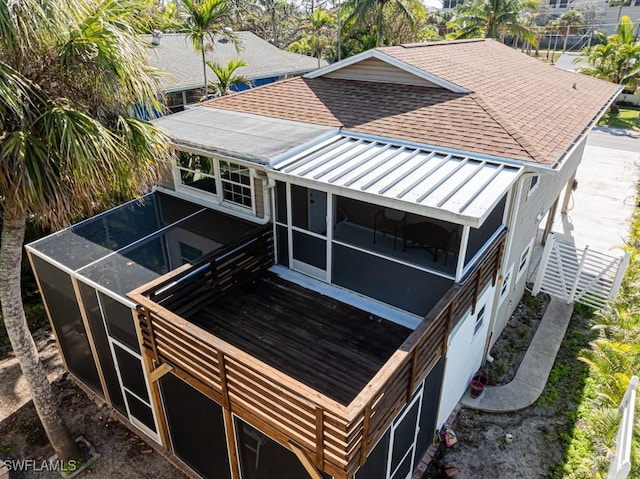 exterior space featuring glass enclosure