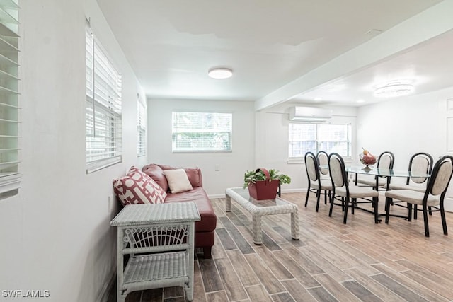 living room featuring a wall mounted air conditioner