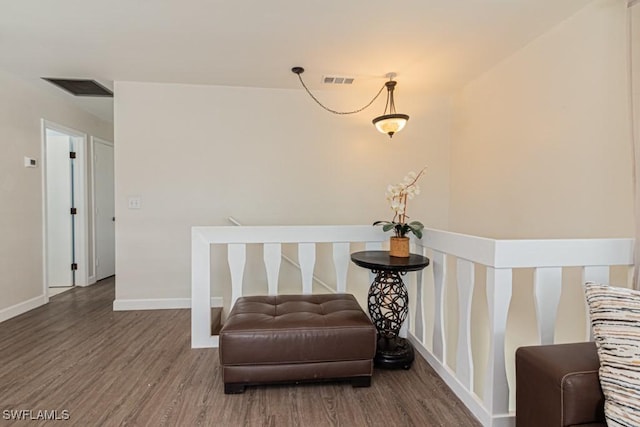 sitting room featuring hardwood / wood-style floors